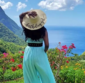 woman flaunting a Custom Birthday Straw Hat